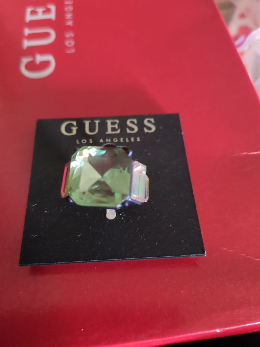 GUESS Green Faceted Crystal Statement Ring with Iridescent Side Stones